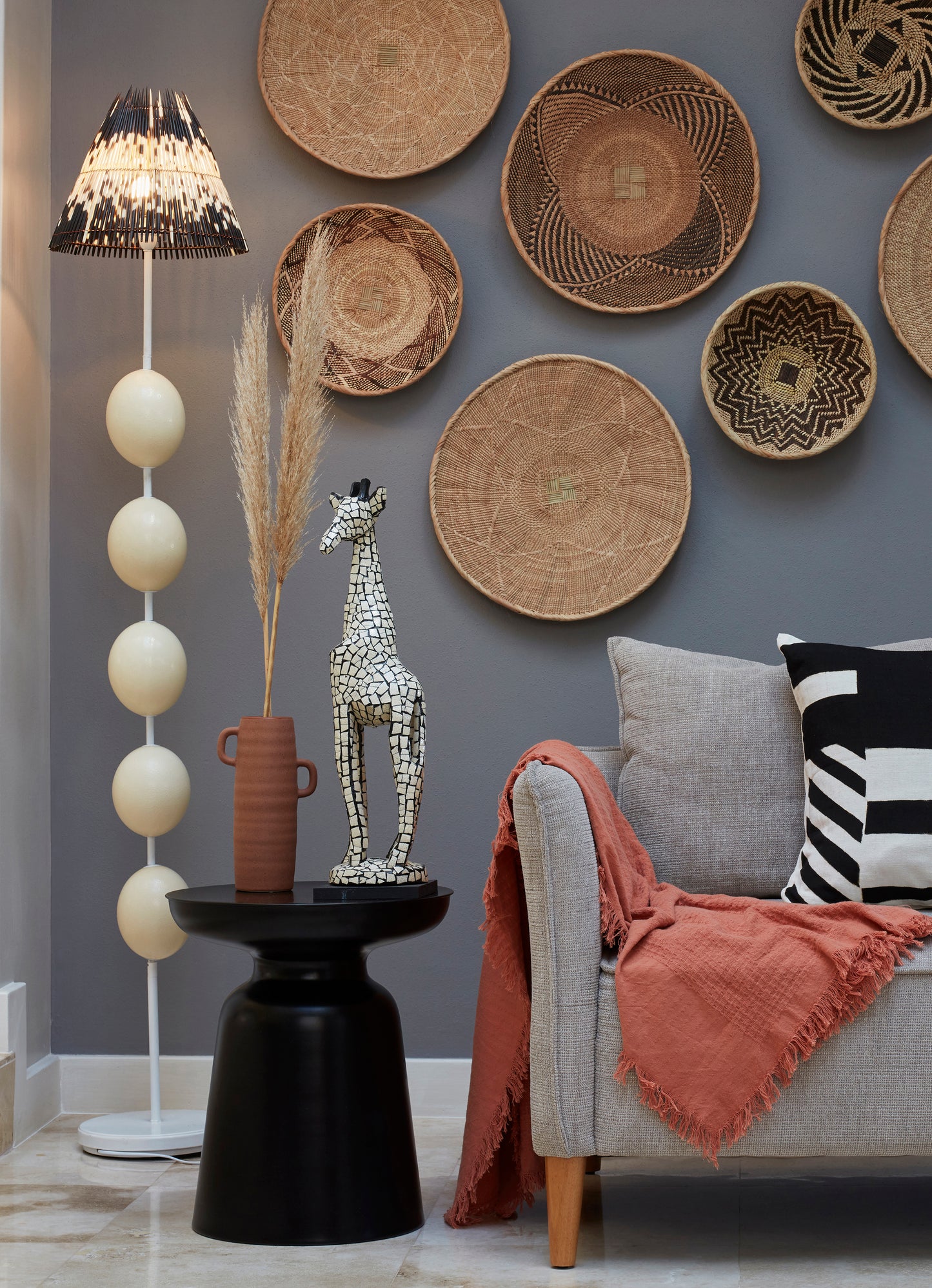 Porcupine quill lampshade with ostrich eggshell lamp base