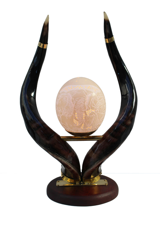 Big 5 etched ostrich eggshell set on a kudu horn lamp