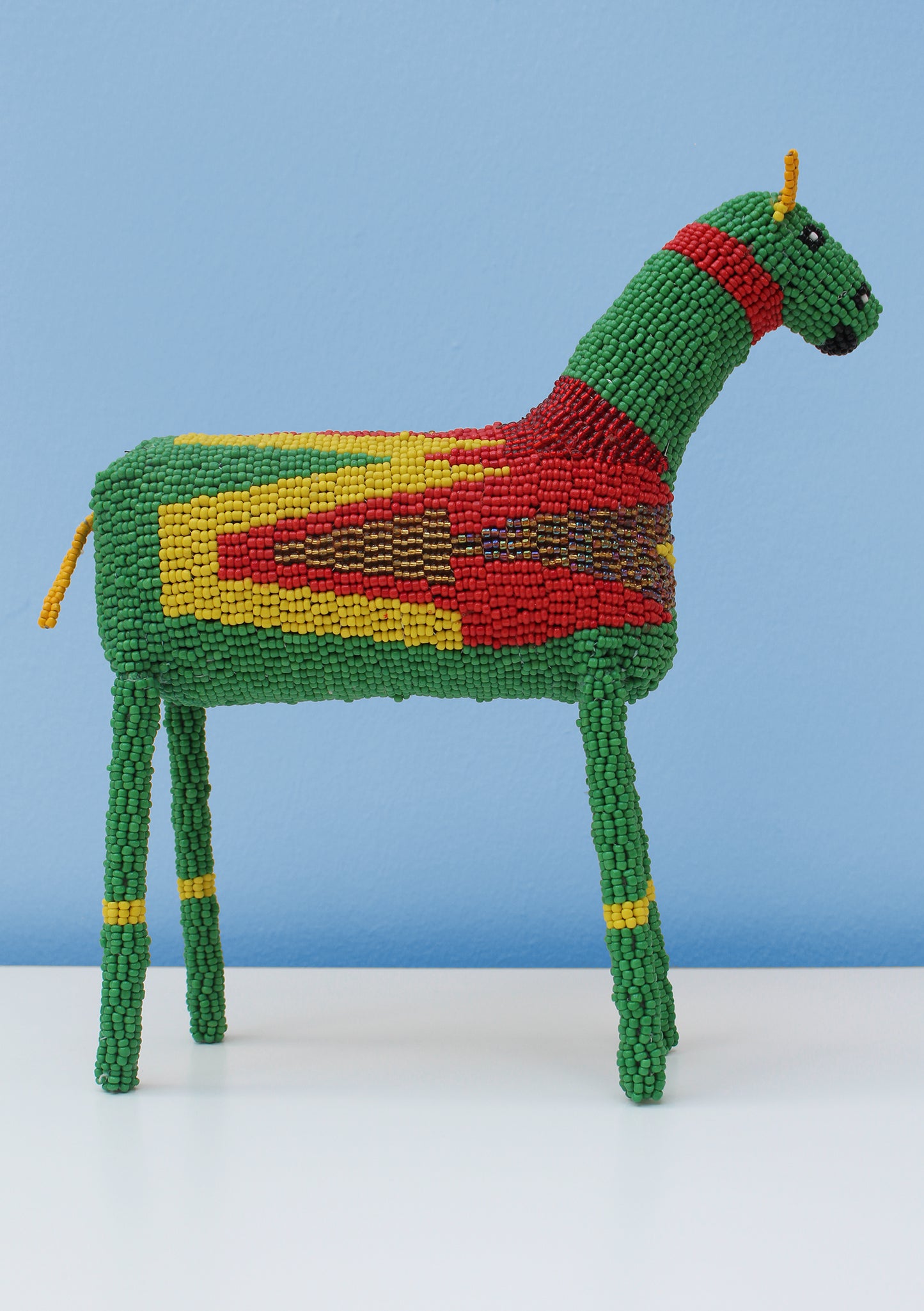 Multi-coloured beaded horse