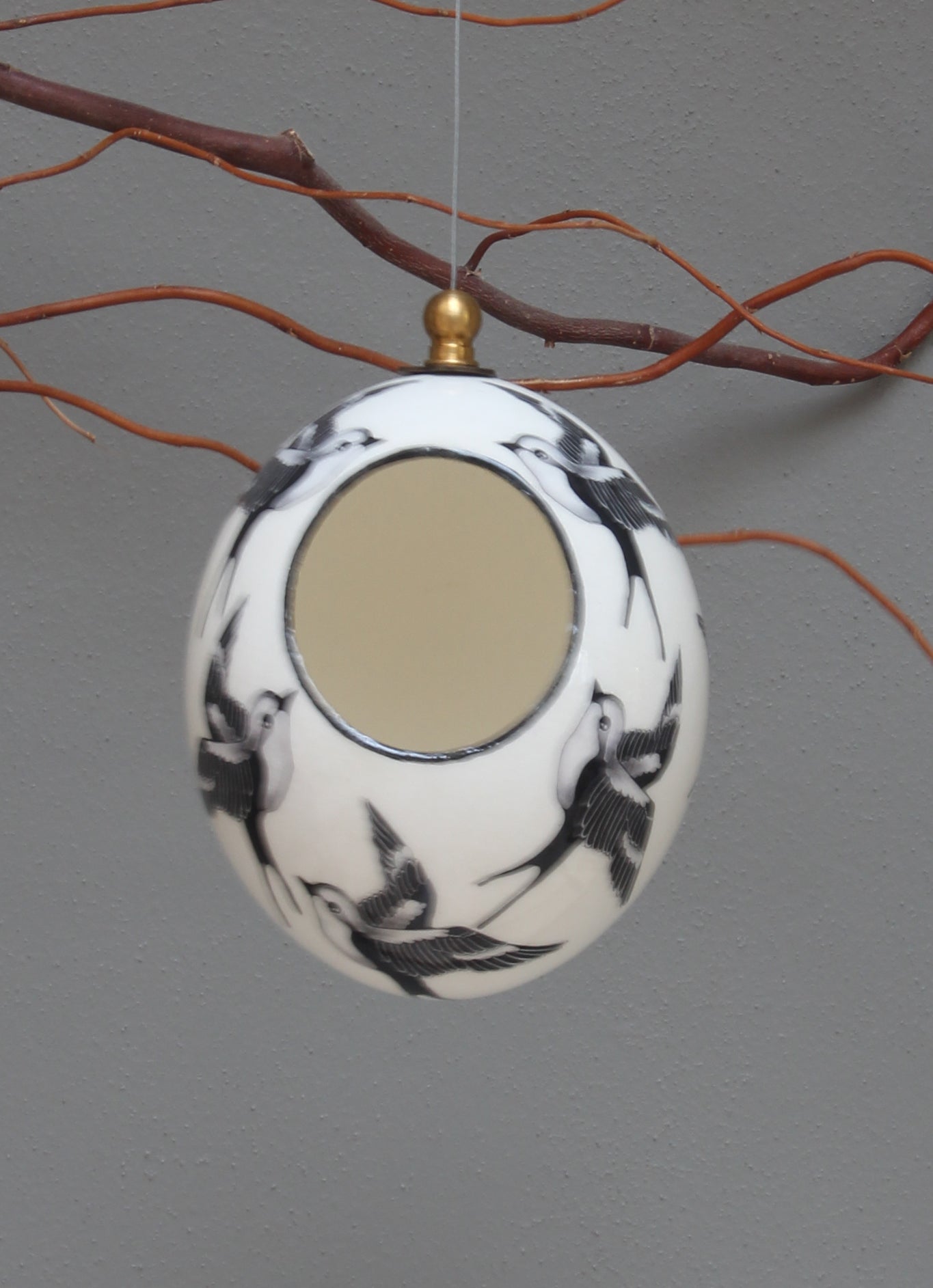 Painted Ostrich eggshell birdfeeder