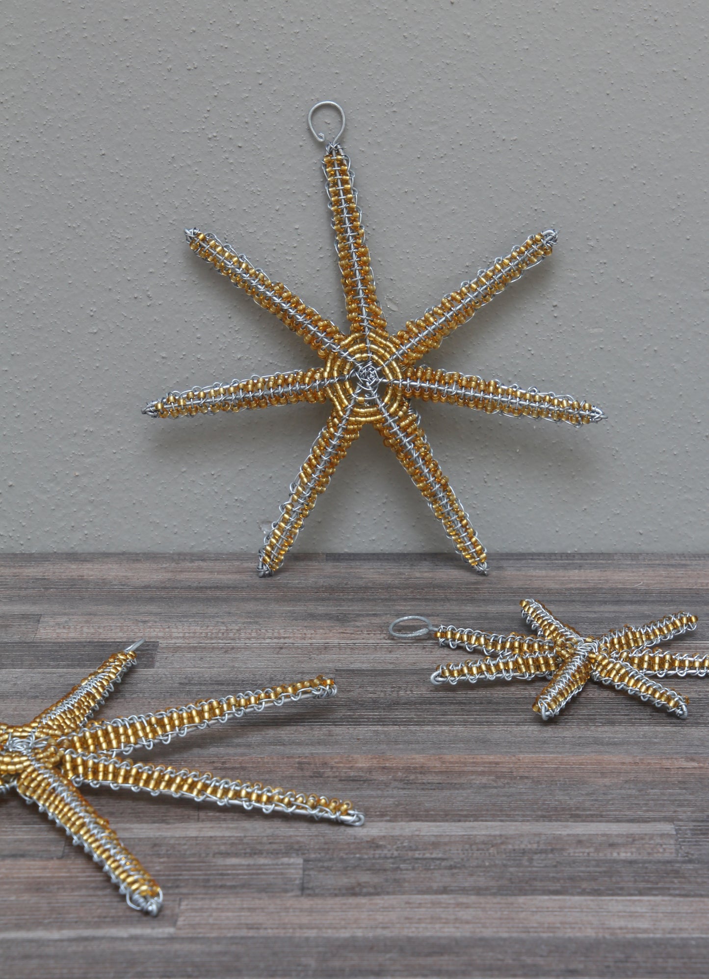 Christmas gold beaded star decorations