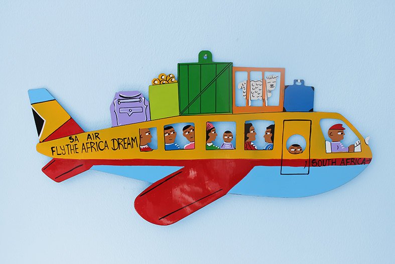 Hand crafted metal plane wall hanging