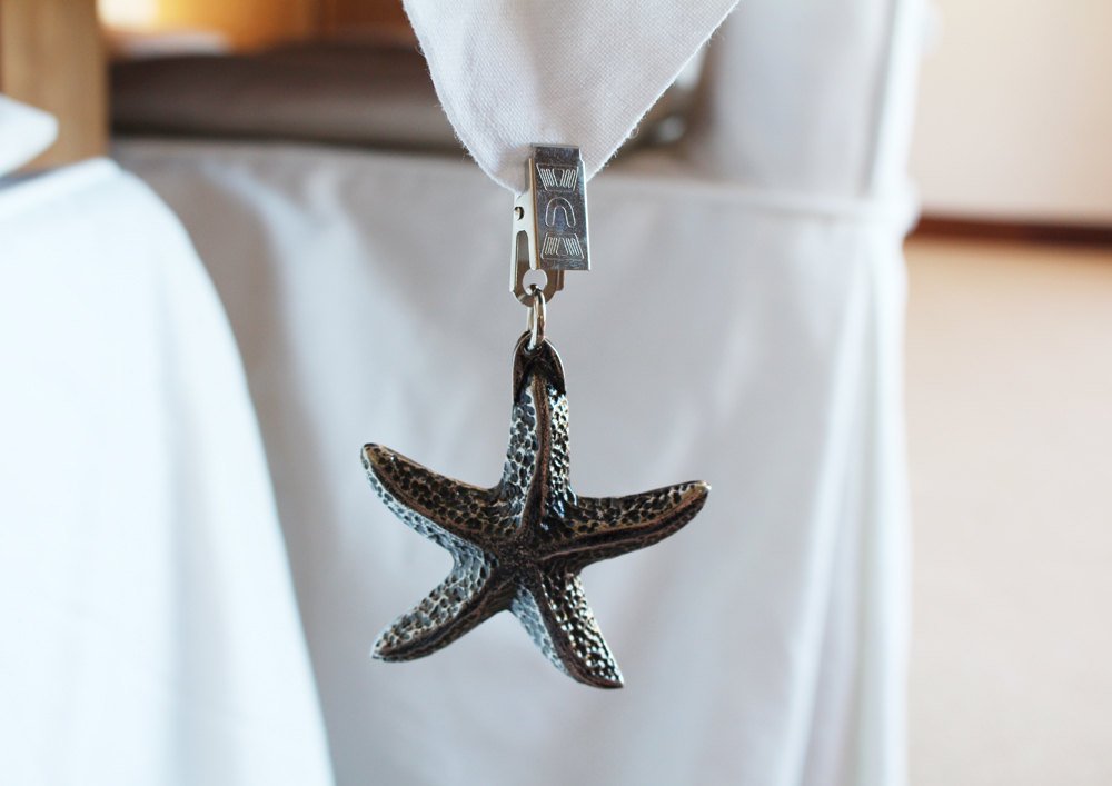 Antique nickel starfish tablecloth weights