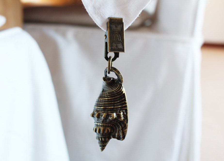 Brass seashell tablecloth weights
