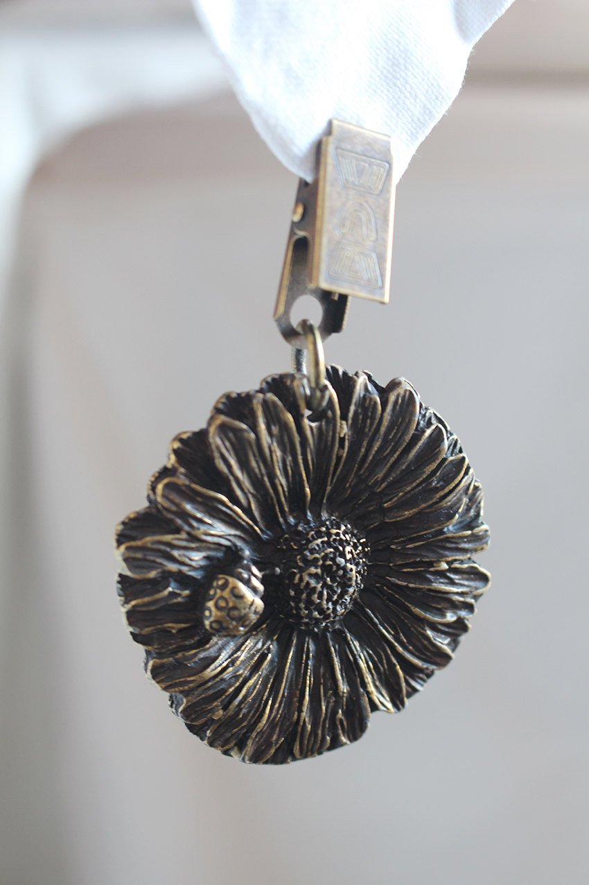 Sunflower with ladybird tablecloth weights