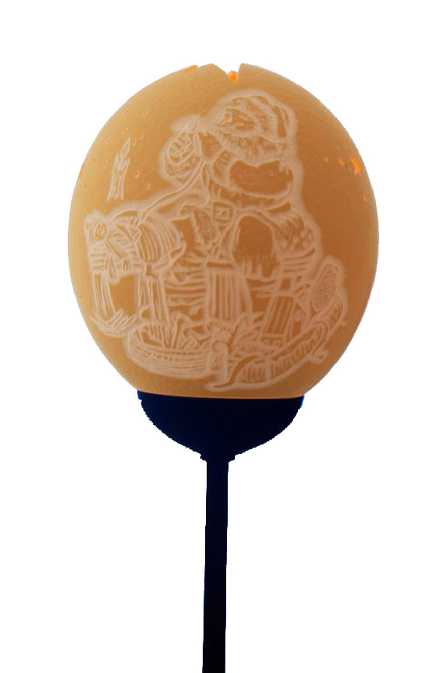 Father Christmas and child themed ostrich egg lamp