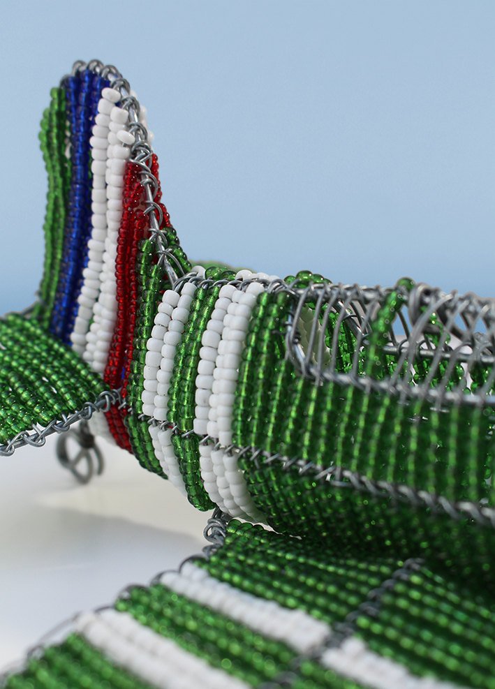 Green-beaded airplane