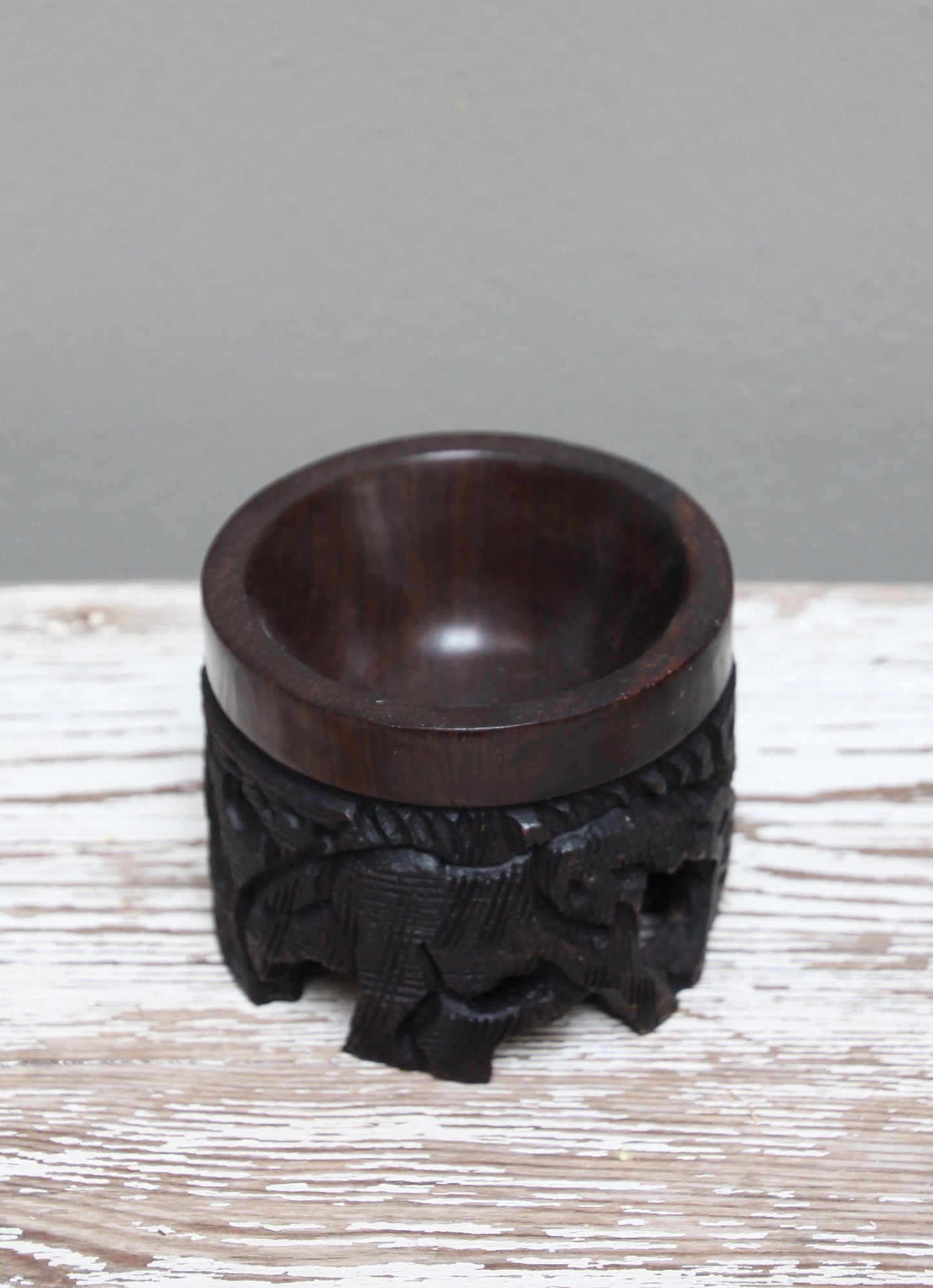 Ebony carved wooden egg stand