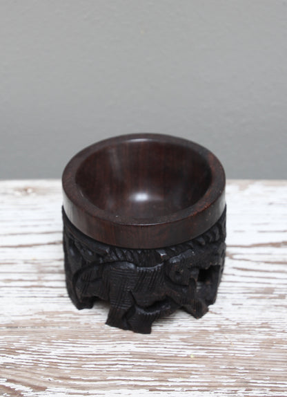 Ebony carved wooden egg stand