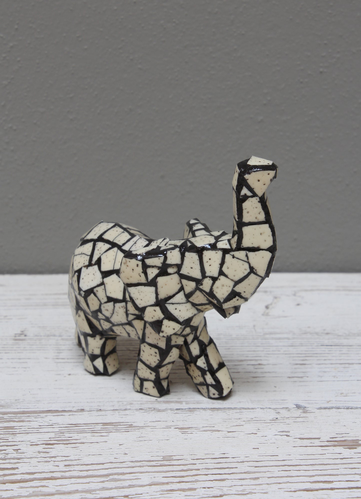 Mosaic eggshell elephant in varying sizes