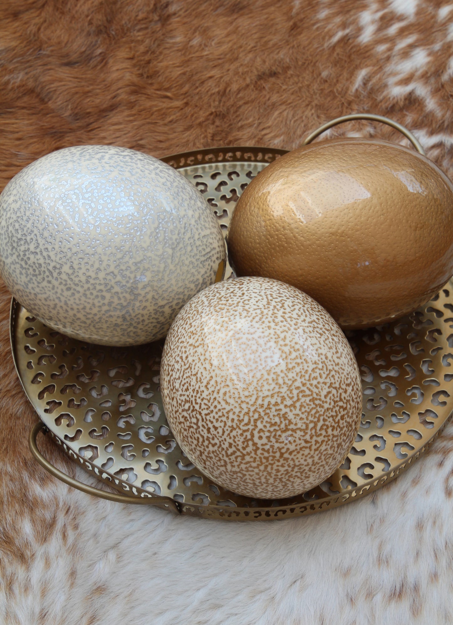 Speckled cream and gold ostrich egg