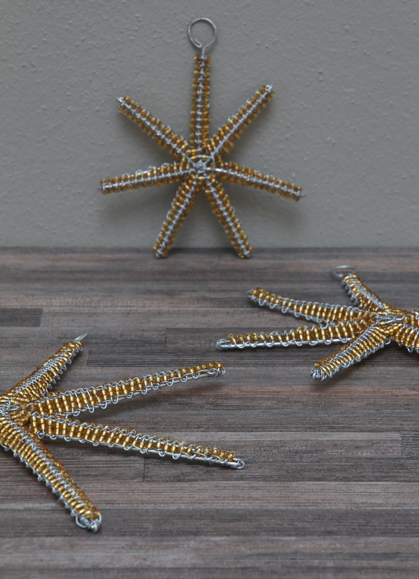 Christmas gold beaded star decorations