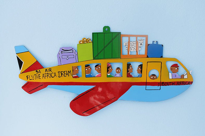 Hand crafted metal plane wall hanging