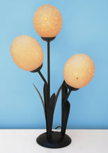 Load image into Gallery viewer, Starburst etched ostrich eggshell set on a flower lamp stand