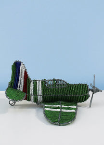 Green-beaded airplane
