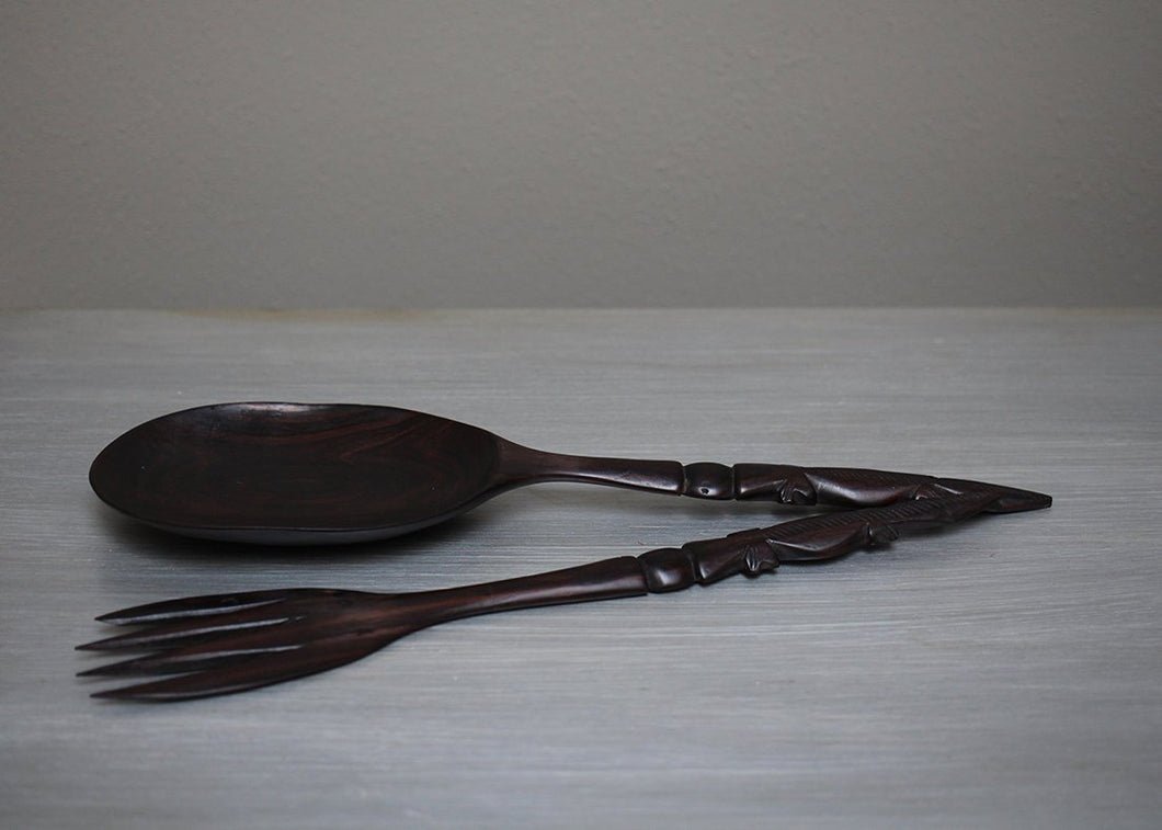Carved ebony salad servers