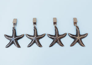 Antique nickel starfish tablecloth weights