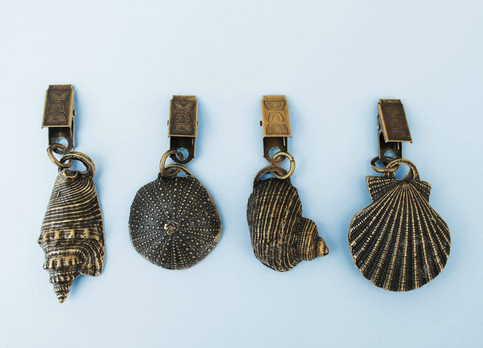 Brass seashell tablecloth weights