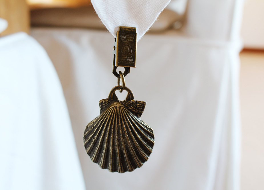 Brass seashell tablecloth weights